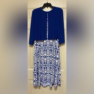 Dress with detached solid-colored shrug.